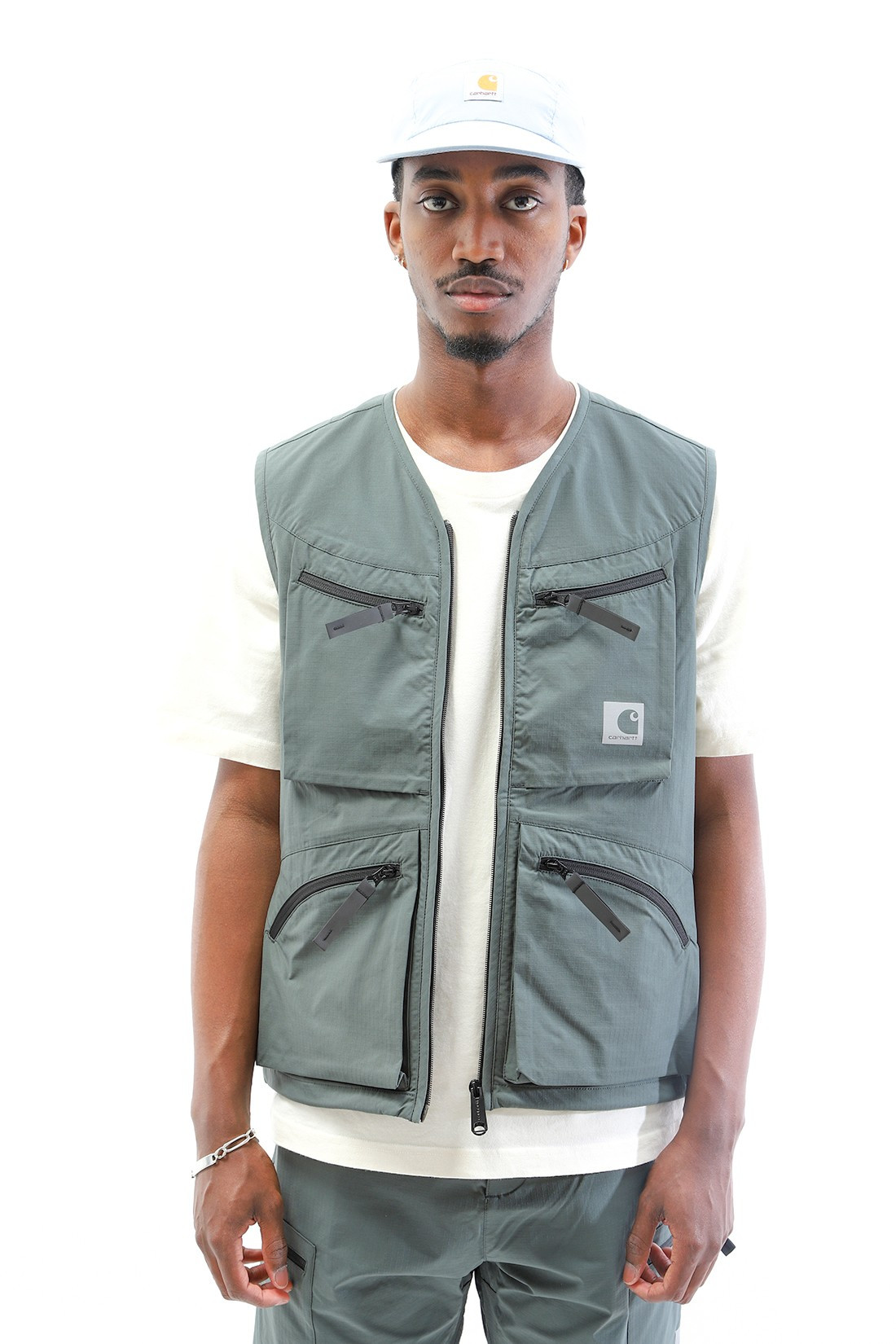 green sleeveless vest